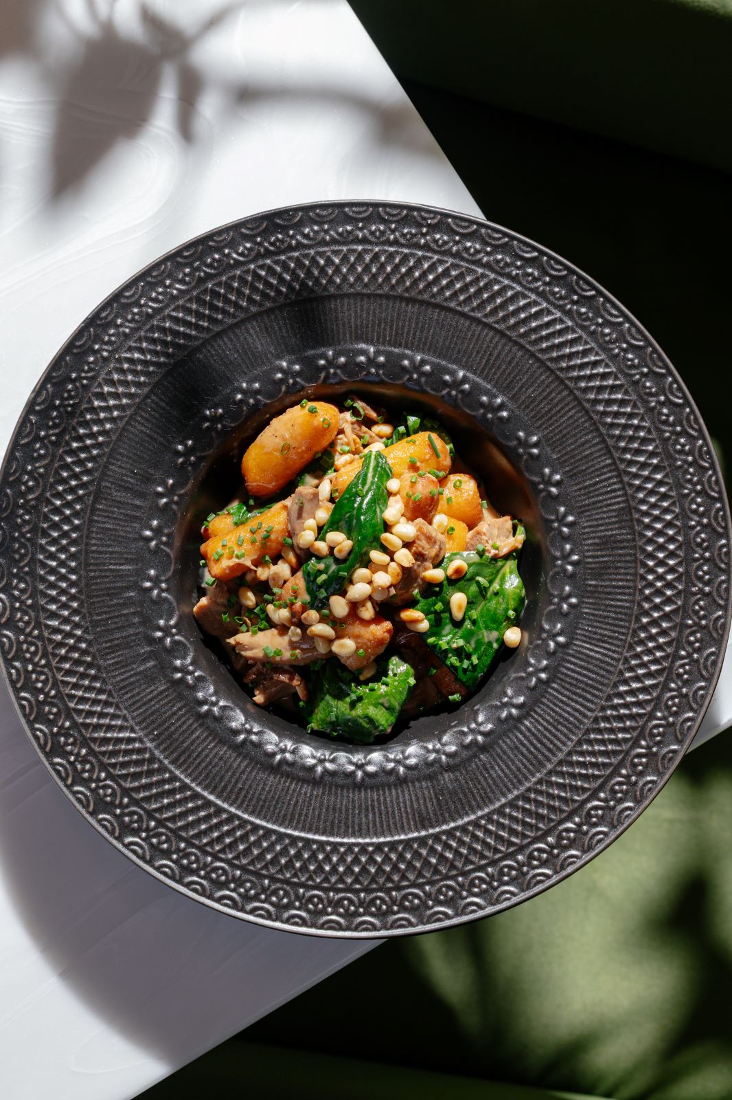 Утка конфи с ленивыми варениками и кедровыми орехами